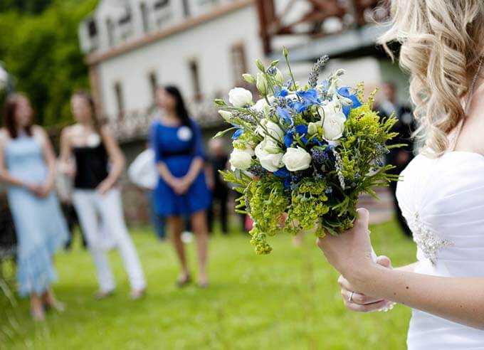 Bride holding flowers at a wedding venue