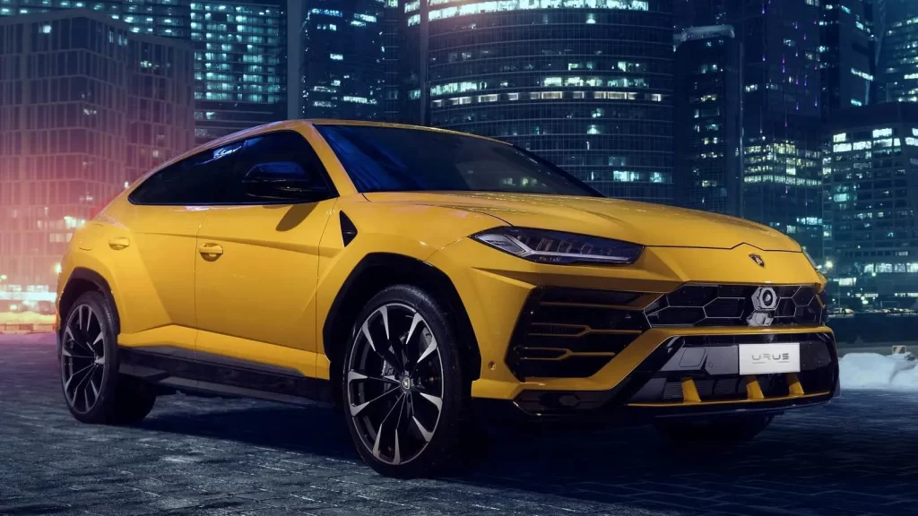 Lamborghini Urus with a nighttime city backdrop