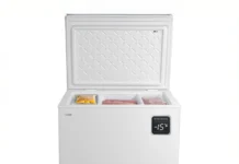 White LOGIK Chest Freezer with frozen food.