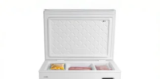White LOGIK Chest Freezer with frozen food.